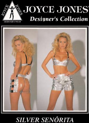 Top e pantaloncini argentati con fasce elastiche.