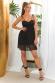 Vestito nero coprente con tulle, paillettes e perline.
