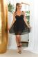 Vestito nero coprente con tulle, paillettes e perline.