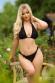 Slip bikini in tessuto brillante con dettaglio nodo. Nero