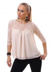 Blusa con inserti in pizzo. Beige