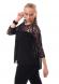 Blusa con inserti in pizzo. Nero