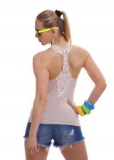 Top con ricamo posteriore. Beige