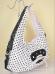 Borsa bianca con pois neri.
