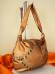 Borsa bronzo con monetine pendenti.