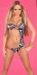 Monokini zebrato asimmetrico con catenelle e ciondoli.