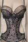 Body in microrete ricamata con volants. Beige-nero