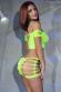 Top e shorts con intagli. Verde acceso