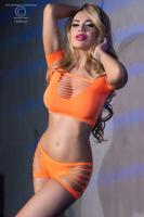 Top e shorts con intagli. Arancione