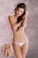 Micro tanga in pizzo con fiocchetto posteriore. Bianco